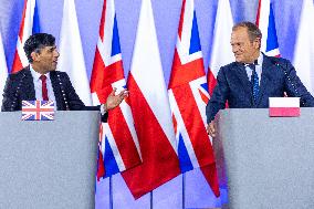 Poland's Prime Minister Donald Tusk Hosts UK Prime Minister Rishi Sunak