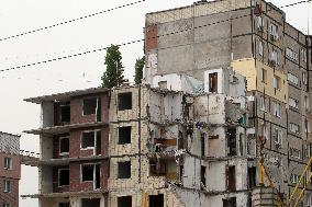 Dismantling sections of Dnipro apartment block destroyed by Russian missile