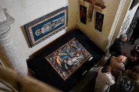 Old cloth icons displayed at Lviv church