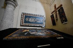 Old cloth icons displayed at Lviv church