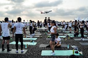 Brew Yoga On Runway At Suvarnbhumi Airport.
