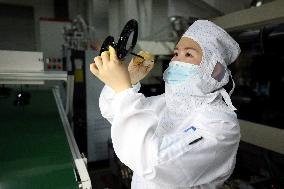 An Optical Manufacturing Enterprise in Fuzhou