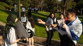 Pro Palestine And Pro Israe Protesters Verbally Clash Outside The UCLA Gaza Support Encampment.