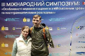 Heavily wounded Ukrainian defender Andrii Smolenskyi takes part in international symposium on rehabilitation of military personn