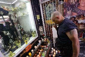 Devotees To Santa Muerte Give Thanks For Favors Received