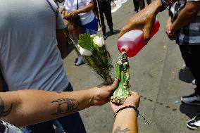 Devotees To Santa Muerte Give Thanks For Favors Received