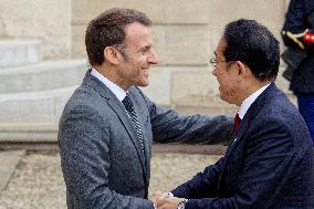 France's President Emmanuel Macron Welcomes Japan's Prime Minister Fumio Kishida