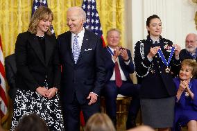 President Biden presents Ledecky with the Presidential Medal of Freedom