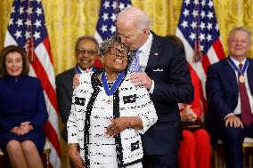 President Biden presents Lee with the Presidential Medal of Freedom