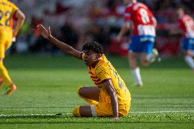 Lamine Yamal of FC Barcelona  in action during the LaLiga EA Sports 2023 - 2024 match between Girona FC v FC Barcelona  at Estad