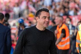 Xavi coach of FC Barcelona  looks on during the LaLiga EA Sports 2023 - 2024 match between Girona FC v FC Barcelona  at Estadi M