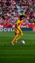 Lamine Yamal of FC Barcelona  in action during the LaLiga EA Sports 2023 - 2024 match between Girona FC v FC Barcelona  at Estad