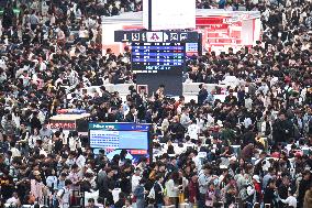 Passengers Return From Hongqiao Railway Station in Shanghai