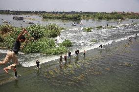 Children Playing In The Nile River In Qanatir Al-Khairiya