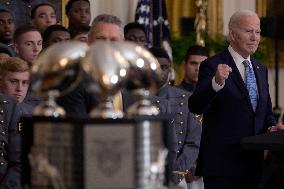 President Biden Hold A Black Knight Trophy Football Team Presentation