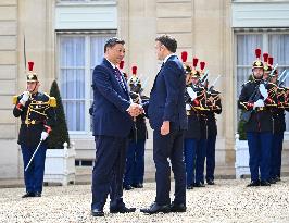 FRANCE-PARIS-XI JINPING-MACRON-VON DER LEYEN-CHINA-FRANCE-EU TRILATERAL MEETING
