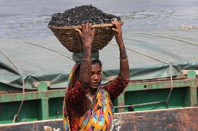 Labourers Are Unloading Coal From A Cargo Ship - Bangladesh