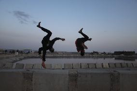 Young Palestinians Practicing Parkour - Rafah