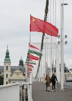 HUNGARY-BUDAPEST-CHINESE AND HUNGARIAN NATIONAL FLAGS