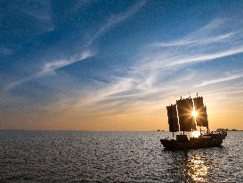 Sailboats in The Sunset Glow in Huai 'an