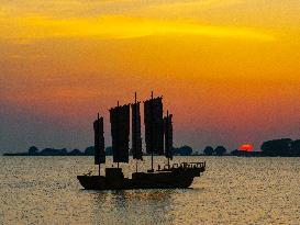Sailboats in The Sunset Glow in Huai 'an