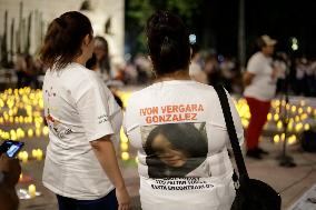 Searching Mothers At Vigil For Missing Persons
