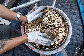 Visitors' Coins In Rome's Trevi Fountain Provide Practical Help To Italians