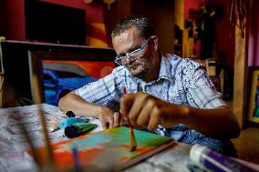 A Painter With Learning Disabilities In Poland