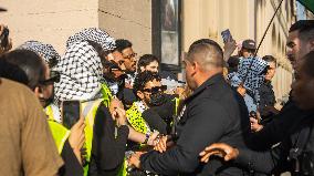 Pro Palestine Protesters Clash With The LAPD Outside Of The Shrine Auditorium During A Graduation Ceremony For USC