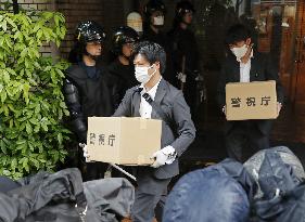 Tokyo police raid political group over election campaign obstruction