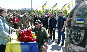 Kyiv region pays last respects to soldier Yevhen Slyvka
