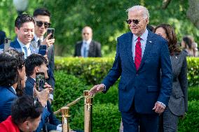 US President Joe Biden  delivers remarks during a reception celebrating Asian American, Native Hawaiian, and Pacific Islander He