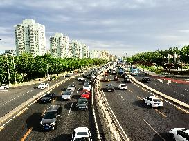 Traffic Flows at Sunset  in Beijing