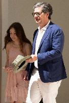 Cannes - Romy Croquet and Roman Coppola Exit The Carlton