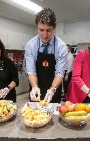 Prime Minister Trudeau Prepares Food for Students - Canada