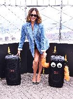 Chrissy Teigen Visits The Empire State Building - NYC