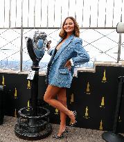 Chrissy Teigen Visits The Empire State Building - NYC
