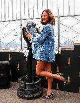 Chrissy Teigen Visits The Empire State Building - NYC