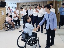 CHINA-BEIJING-SHEN YIQIN-HELPING THE DISABLED-ACTIVITY(CN)