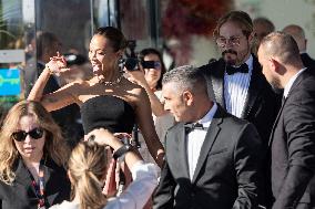 Cannes - Zoe Saldana And Marco Perego Exit Marriott Hotel