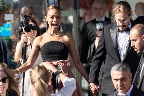 Cannes - Zoe Saldana And Marco Perego Exit Marriott Hotel