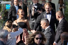 Cannes - Zoe Saldana And Marco Perego Exit Marriott Hotel