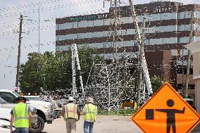 Electrical Crews Work To Restore Power To Houston Residents After Deadly Storm