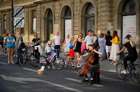 Cello Player In Streets Of Warsaw