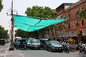 Makeshift Green Shades Tent For Commuters On Hot Summer Day In Jaipur