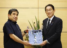 Japan PM Kishida given Okinawan shirt