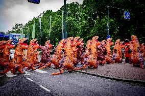 World Biodiversity Day Protest In Dinosaur Costumes - The Hague