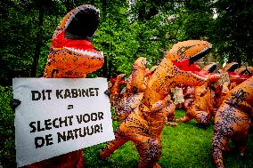 World Biodiversity Day Protest In Dinosaur Costumes - The Hague