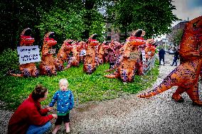 World Biodiversity Day Protest In Dinosaur Costumes - The Hague