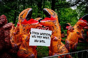 World Biodiversity Day Protest In Dinosaur Costumes - The Hague